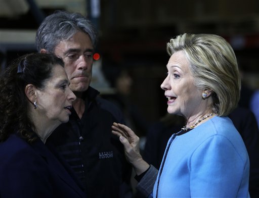 Democratic presidential candidate Hillary Rodham Clinton meets with employees at Whitney Brothers during a campaign stop in Keene, N.H., on Monday. The Associated Press