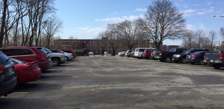 A city-owned parking lot on lower Front Street in Waterville, which has about 60 spaces, will remain completely open to the public after the City Council voted 6-1 Tuesday, April 21, against a proposal to lease 30 of the spaces to the developer of the Hathaway Creative Center. 
