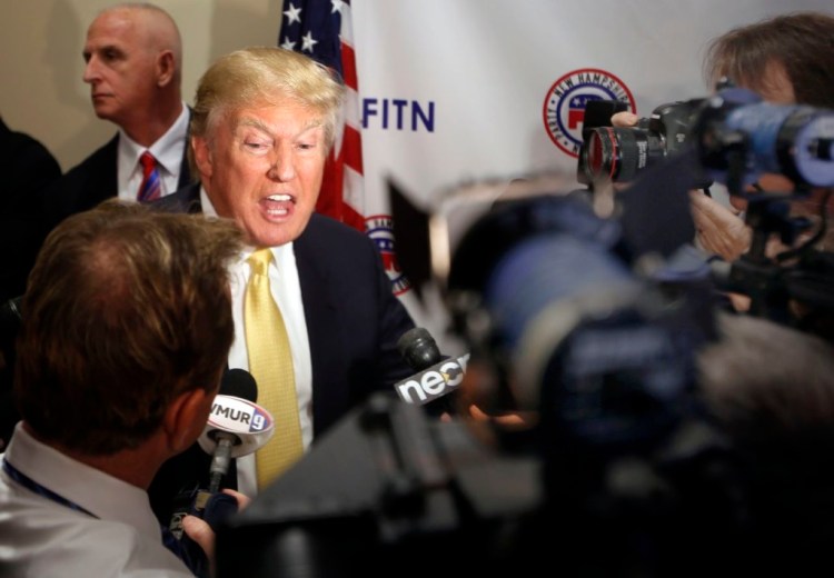 Donald Trump speaks to reporters after addressing at the Republican Leadership Summit Saturday on April 18, 2015, in Nashua, N.H. The Associated Press