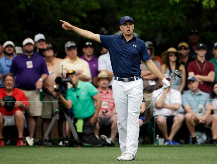 Jordan Spieth calls out his ball after teeing off the seventh hole during the fourth round of the Masters golf tournament Sunday. The Associated Press