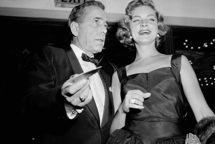 Lauren Bacall attends the Oct. 12, 1955, premiere of “The Desperate Hours” in Los Angeles with her husband, Humphrey Bogart. Associated Press file photo