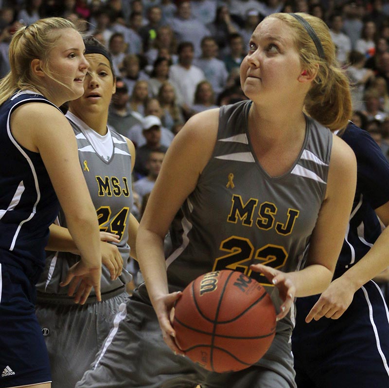 Mount St. Joseph's Lauren Hill catches a pass and prepares to shoot during her first NCAA college basketball game in November 2014.