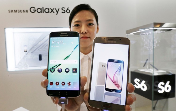 A model holds Samsung 's Galaxy S6 Edge, left, and Galaxy S6 at the company's headquarters in Seoul. When Samsung dubbed development of its latest smartphones “Project Zero,” it was sounding a note of desperation as sales tumbled and it lost pole position in the crucial Chinese market to rivals Xiaomi and Apple. The Associated Press