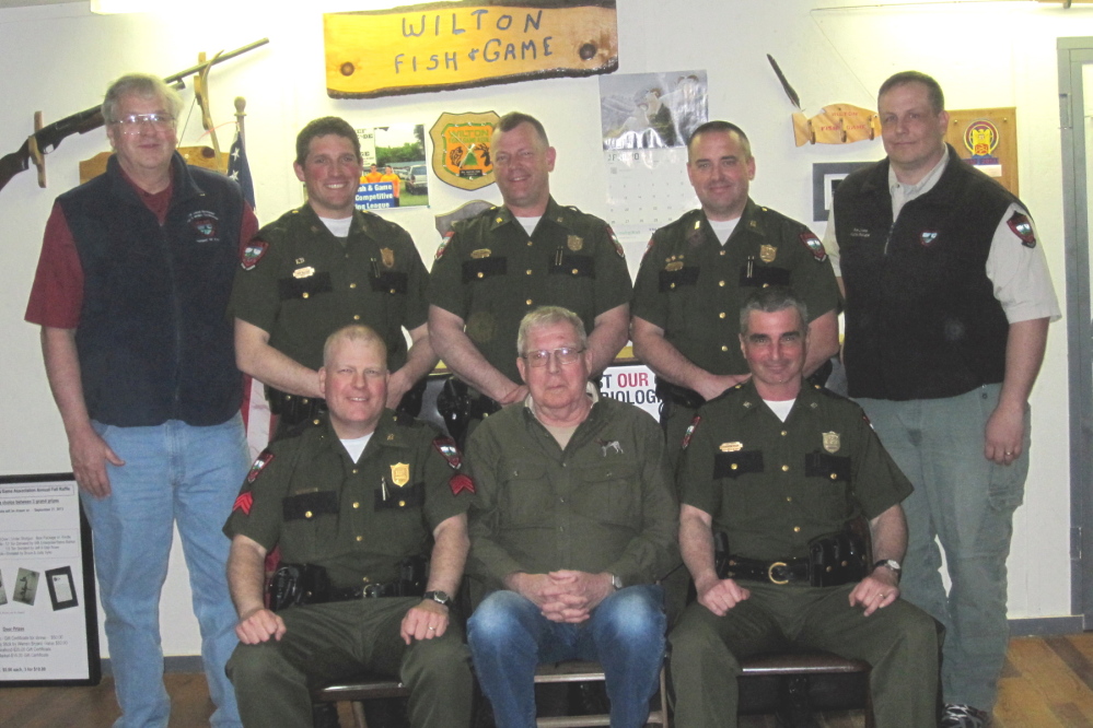 Front row, from left, are  Sgt. Scott Thrasher, Wilton Fish & Game Association Vice President Charles Tappan and Warden Patrick Egan. Back, from left, are Regional Wildlife Biologist Chuck Hulsey, Warden Kristopher MacCabe, Warden Scott Stevens, Warden Brock Clukey and Regional Wildlife Biologist Bob Cordes.