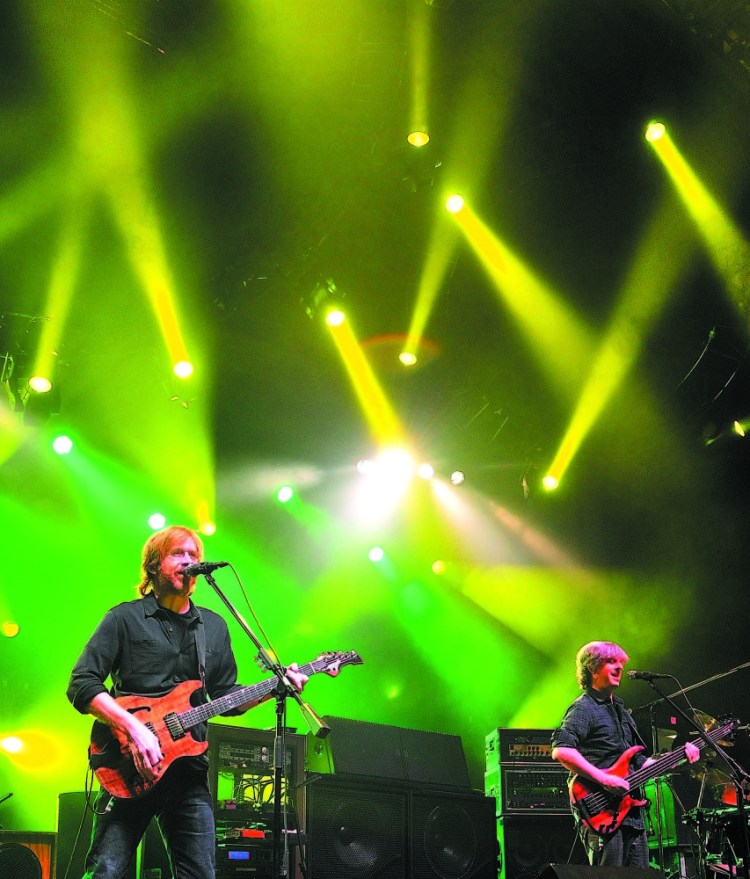 Trey Anastasio on guitar, left, and Mike Gordon on bass play in 2010 during a Phish concert at the Augusta Civic Center. In recent years, the civic center has had trouble bringing big concerts to the city.