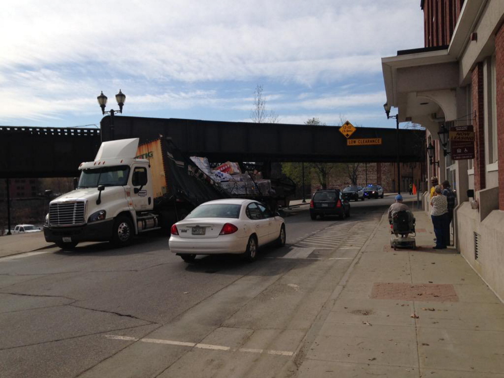 A tractor-trailer struck the railroad trestle on Water Street in Augusta Tuesday morning, backing up traffic.