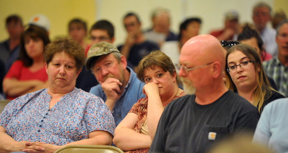 Skowhegan area residents listen to the SAD 54 School Board during a board meeting at Skowhegan Junior High School Thursday night. The name change was voted down.