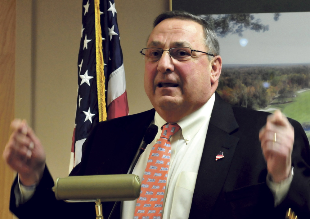 Gov. Paul LePage speaks about state financial issues during a meeting with members of the Waterville Rotary Club on Feb. 9.