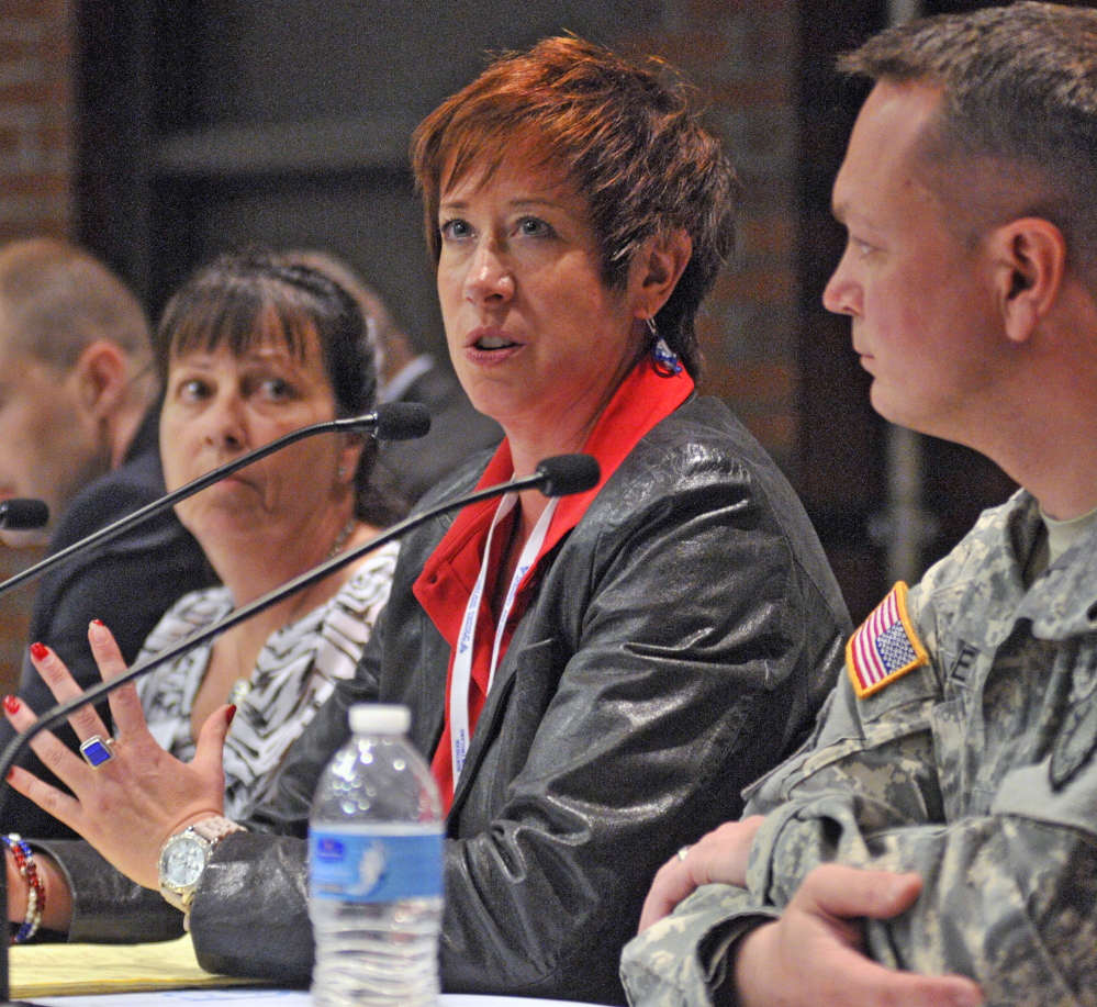 Laura Allen, chapter captain of Team Red, White & Blue Maine, center, speaks during a panel discussion about veterans’ employment issues on Tuesday at the University of Maine at Augusta. Amy Line, veterans’ success coordinator at the University of Maine at Augusta, left, and Sgt. 1st Class Nathaniel Grace, community liaison for the Maine Army National Guard, right, were also on the panel.