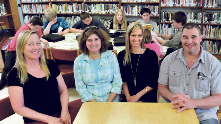 Athens Community School teachers, seen Thursday, have formed a steering committee to study becoming the second school in the state led by teachers. From left are Tammy Moulton, Cheryl Brown, Amy Bown and David Hatch.