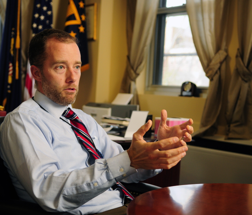 Ryan Lilly, center director of VA Maine Healthcare Systems-Togus, answers questions during an interview on November 20, 2014, in his Togus office.
