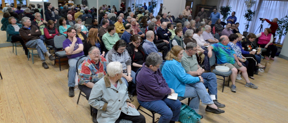Members of the community filled The Forum at the Center during a pay-as-you-throw trash collection system hearing on April 15.