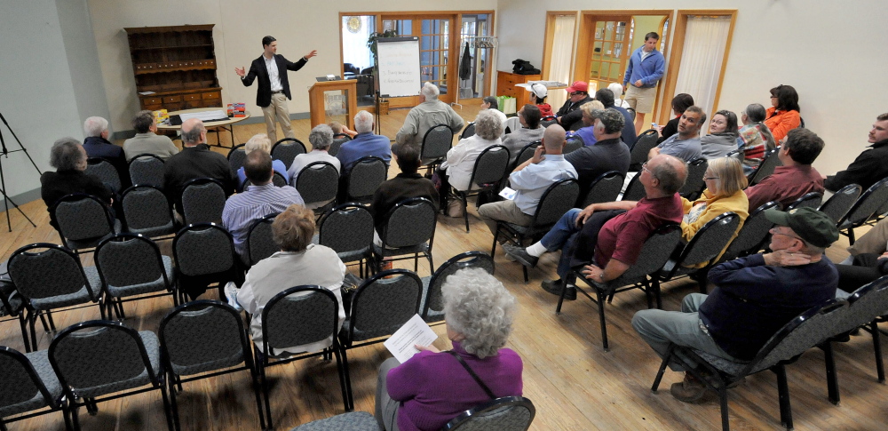 Waterville Mayor Nick Isgro opens a forum Wednesday to educate people on what can be recycled and various types of trash bags available with the pay-as-you-throw trash and recycle program at The Center in Waterville.
