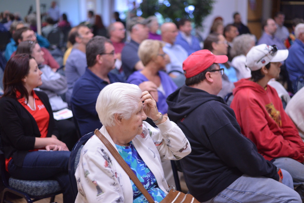 Waterville residents gather for a pay-as-you-throw forum Wednesday at The Center in Waterville. The forum was organized by city officials to educate residents on what can and cannot be recycled and various types of trash bags that can be used with the program.