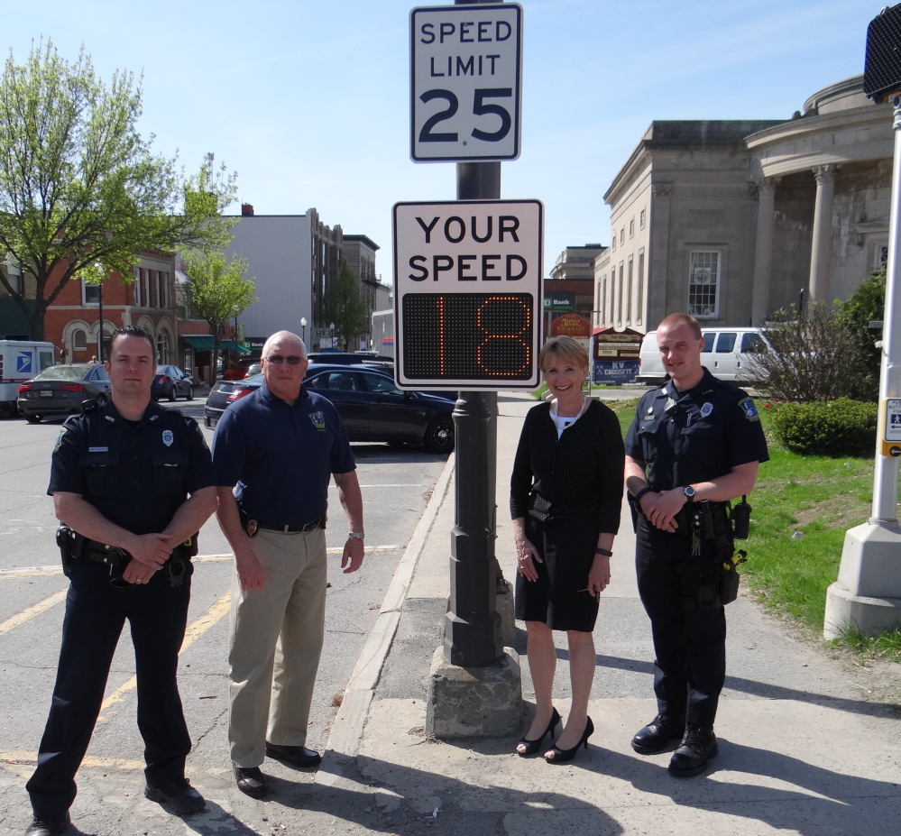 From left, are Officer Damon Lefferts, Police Chief Joe Massey, June L’Heureux, office manager, Waterville Main Street; and Officer Chase Fabian.