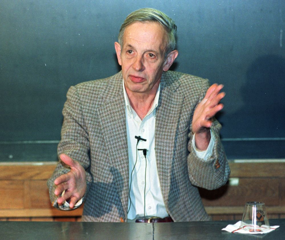 In this Oct. 11, 1994 file photo, Princeton University professor John Nash speaks during a news conference at the school in Princeton, N.J., after being named the winner of the Nobel Peace Prize for economics.