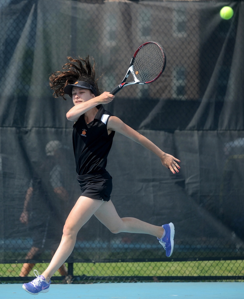 Skowhegan Area High School’s Vasilisa Mitskevich competes Saturday against Greely High School’s Izzy Evans in the state singles championship Round of 16 at Colby College.