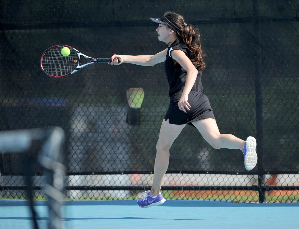 Skowhegan Area High School’s Vasilisa Mitskevich competes Saturday against Greely High School’s Izzy Evans in the state singles championship Round of 16.