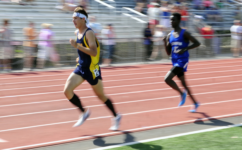 Mount Blue’s Aaron Willingham leads the 3200 meters Saturday during the KVAC track meet at McCann Field in Bath.