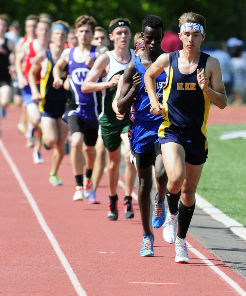 Mount Blue’s Aaron Willingham leads the 3200 meters Saturday during the KVAC track meet in Bath.