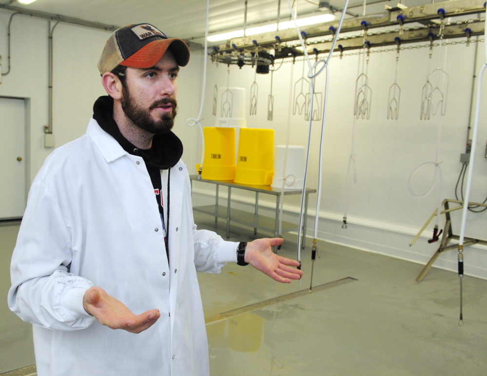 Ryan Wilson leads a tour March 5 at Common Wealth Poultry Co. in Gardiner.