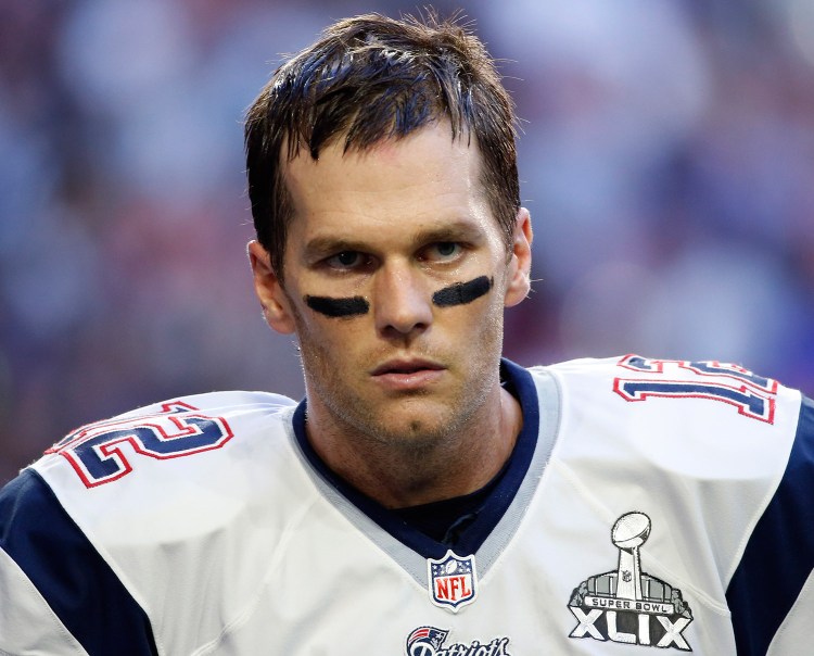 Tom Brady's agent says the Patriots' quarterback will appeal the four-game suspension announced Monday by the NFL.
AP file photo