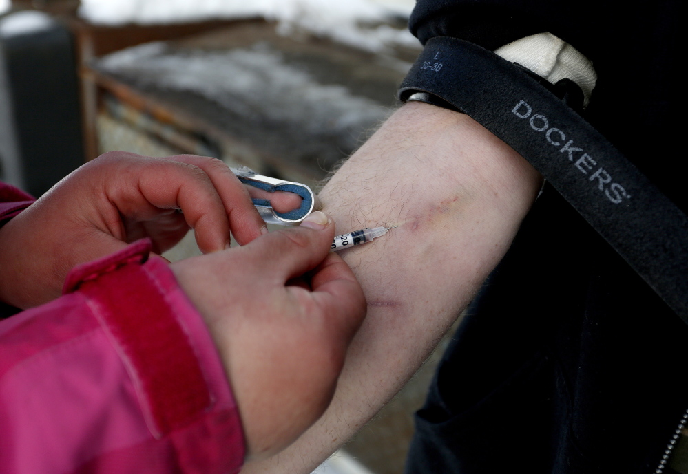 A man being treated for heroin addiction is injected with the drug replacement medication Suboxone in Portland. New Hampshire and Maine have reported particularly acute heroin epidemics.