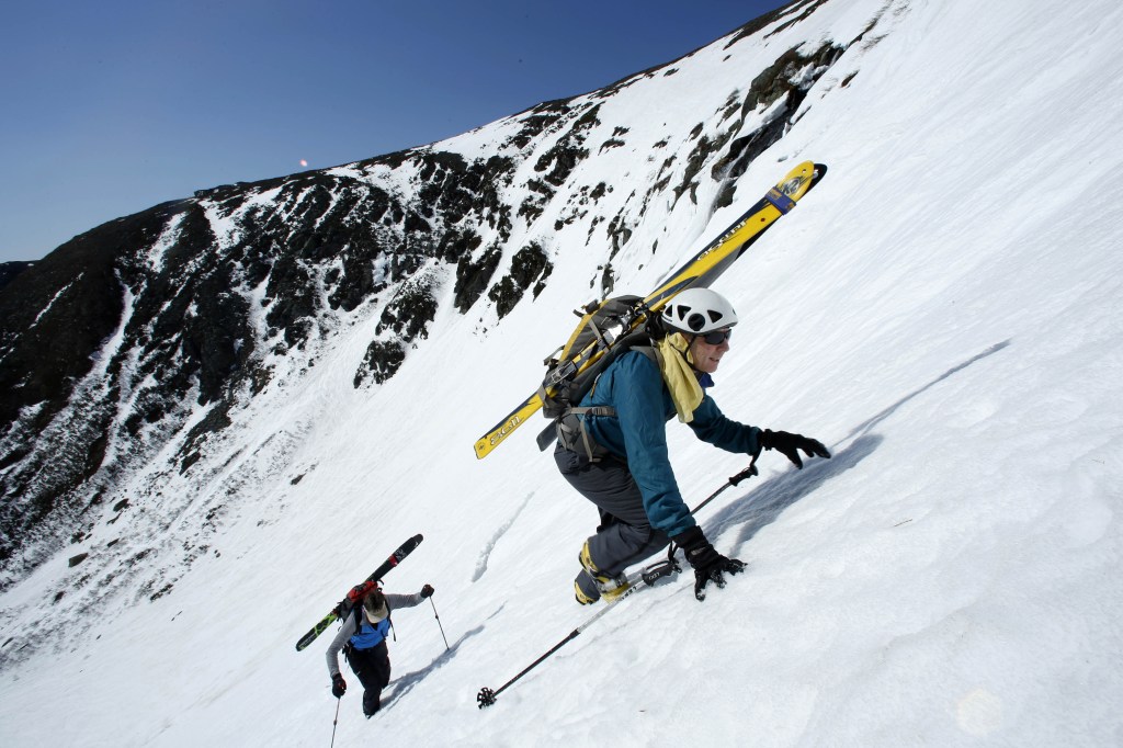 Charlie Carr of Bristol, N.H., leads his friend, Andy Bell of Thornton, N.H., up The Sluice, a slope with a 50-degree pitch in Tuckerman Ravine on Mount Washington.
The Associated Press