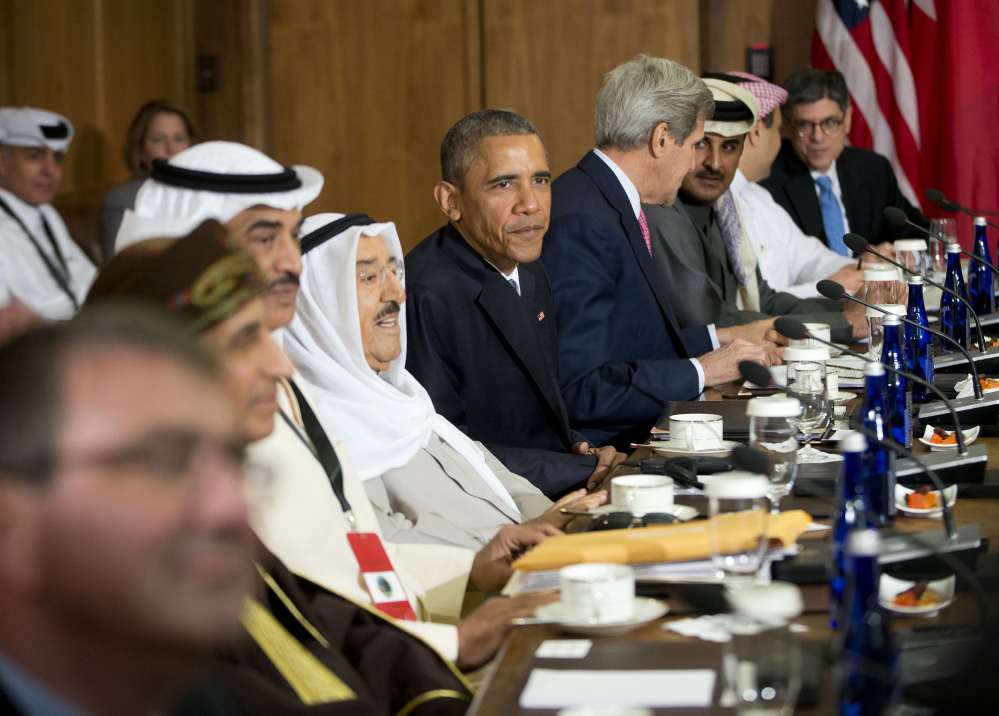 President Barack Obama, Secretary of State John Kerry, and others meet with Gulf Cooperation Council leaders and delegations at Camp David, Md., on Thursday. Obama and leaders from six Gulf nations are trying to work through tensions sparked by the U.S. bid for a nuclear deal with Iran. The U.S. House passed a measure Thursday to give Congress a say in any Iran nuclear dea.