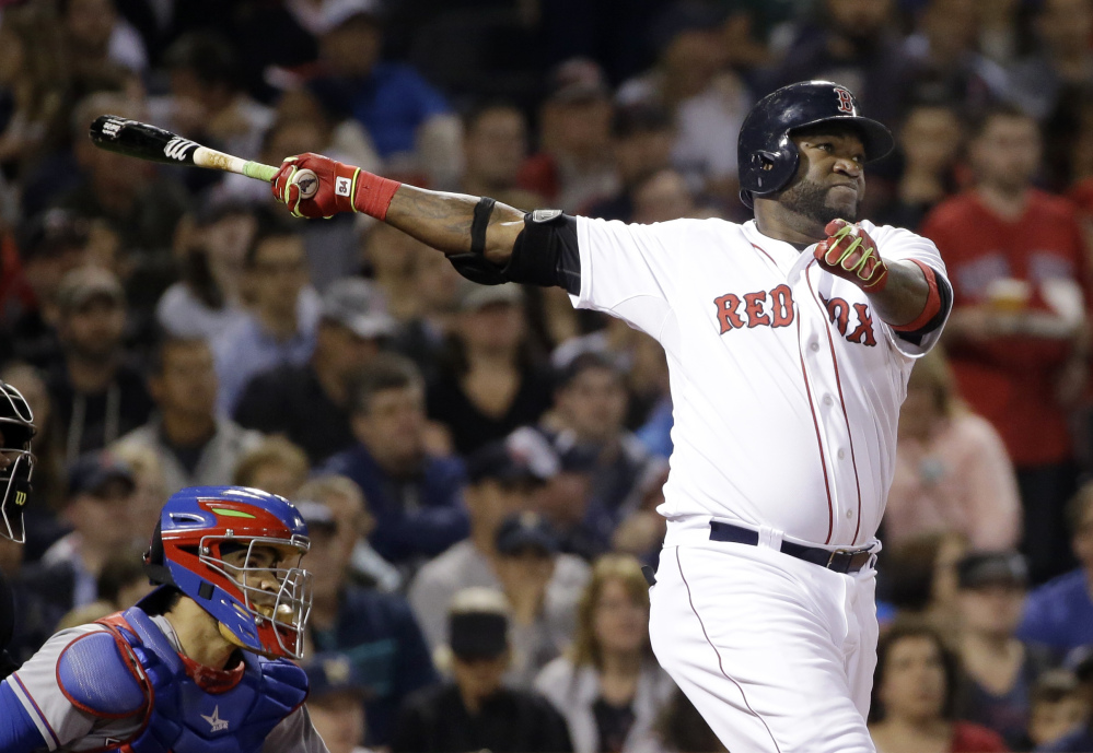 David Ortiz hits a solo home run in the fifth inning Tuesday night as the Red Sox build a 4-0 lead over the Texas Rangers before hanging on for a 4-3 win.