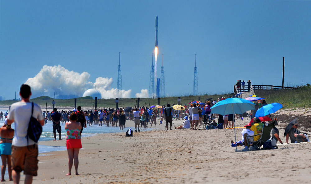 People on the Canaveral National Seashore watch a United Launch Alliance Atlas V rocket lift off from Cape Canaveral Air Force Station in Cape Canaveral, Fla. on Wednesday. The rocket is carrying the X-37B space plane for the U.S. Air Force as well as 10 CubeSats and the Planetary Society's LightSail Mission.
Craig Rubadoux/Florida Today via AP