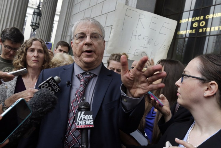 Steven Wise, president of the Nonhuman Rights Project, answers a question outside Manhattan State Supreme Court in New York after a hearing Wednesday. He told a judge that chimpanzees' confinement for research purposes is akin to slavery.
The Associated Press