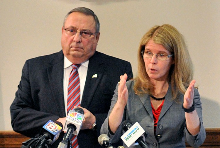 Gov. Paul LePage and Department of Health and Human Services Commissioner Mary  Mayhew speak during a State House news conference Tuesday to unveil a bill to end the so-called "welfare cliff." 