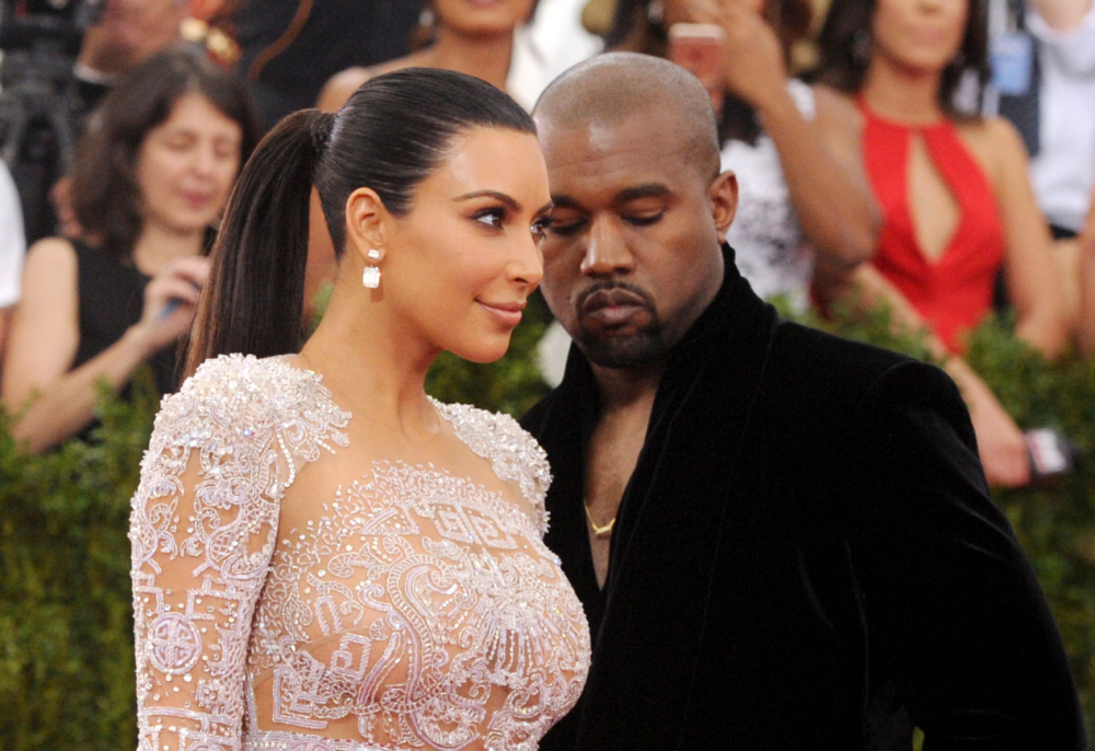 This May 4, 2015, file photo shows Kim Kardashian, left, and Kanye West arriving at The Metropolitan Museum of Art’s Costume Institute benefit gala in New York.