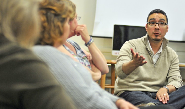 RSU 2 Superintendent Virgel Hammonds, who announced recently he will be leaving the district, speaks to a small group of parents during a meeting last year in the Richmond Middle School library.