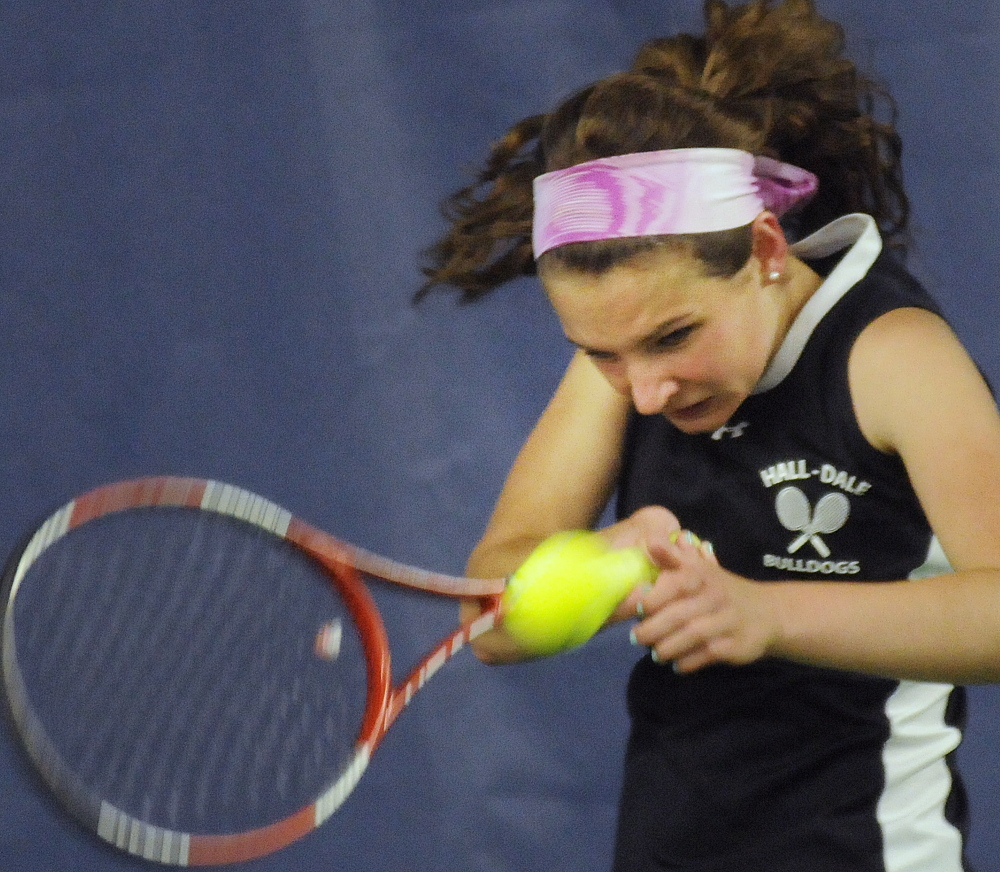 Staff photo by Andy Molloy 
 Hall-Dale High School's Clio Barr returns a shot during a Western C quarterfinal match against Miranda McIntyre of Wiscasset on Monday in Augusta. Barr rolled to a 6-1, 6-2 victory. Hall-Dale 5-0 prevailed to reach the regional semifinals.