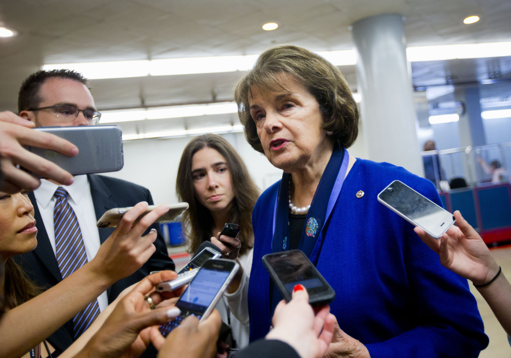 Senate Intelligence Committee Vice Chair Sen. Dianne Feinstein, D-Calif., speaks with reporters on Capitol Hill in Washington on Tuesday. Congress remade the post-9/11 surveillance program and sent the new legislation to President Barack Obama for his signature.