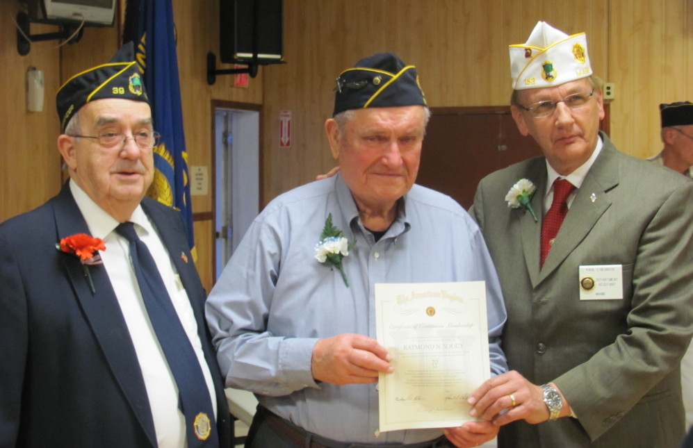 Legion member Raymond Soucy, of Madison, center, recently was presented a certificate for being a member of the American Legion for 70 continuous years, by Post Commander H. Ralph Withee, left, and Department of Maine Adjutant, Paul L’Heureux, right.