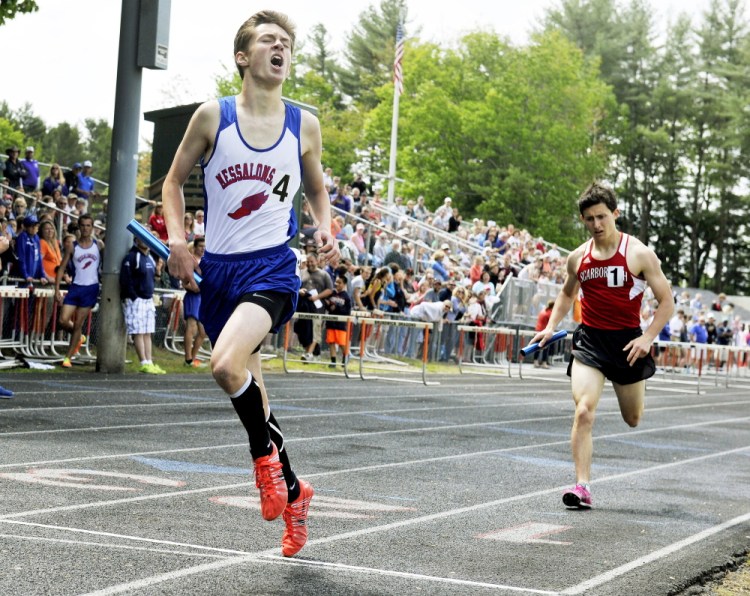 Portland Press Herald photo by John Ewing 
 Messalonskee's Owen Concaugh crosses the finish line to gice the Eagles a victory in the 4x800-meter relay at the Class A state track and field championships Saturday at Mt. Ararat. The Eagles won the event with a time of 8 minutes, 13.75 seconds.