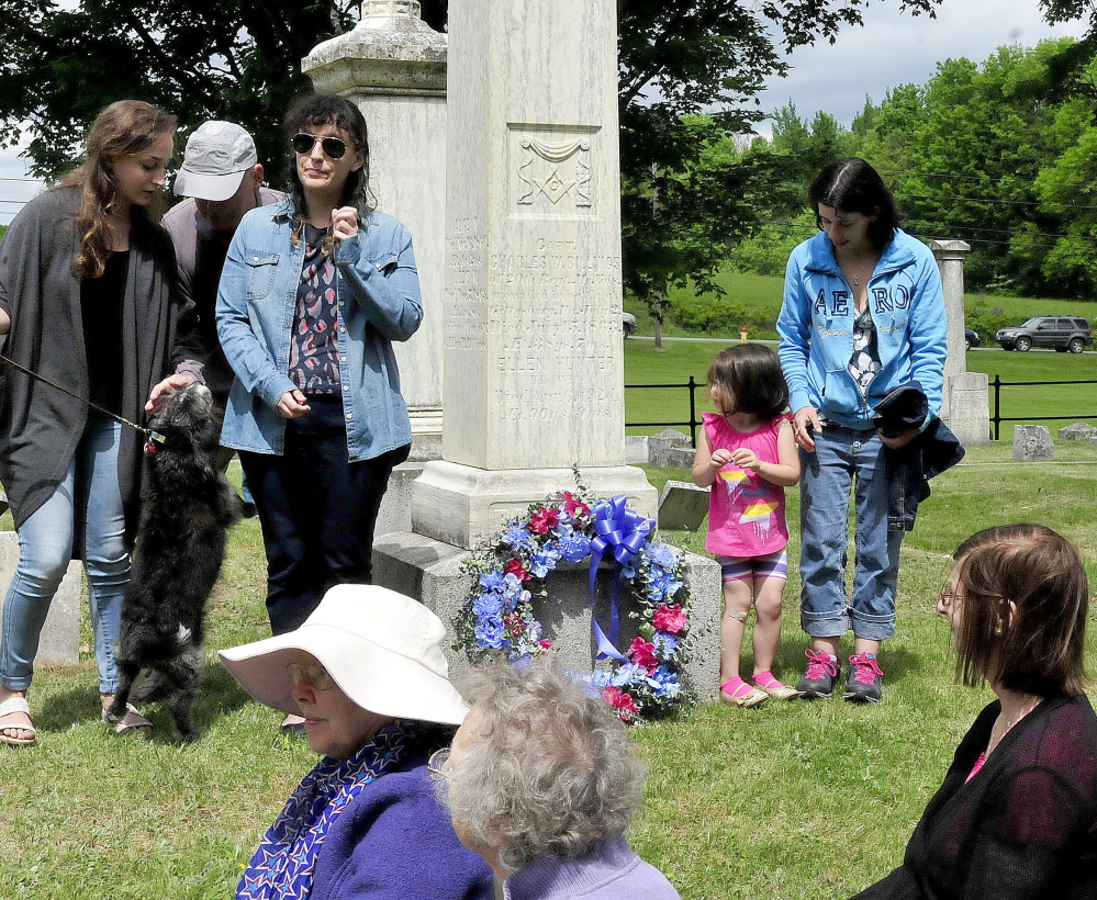 Descendants of Civil War casualty Capt. Charles Billings stand beside Billings’ rededicated grave Saturday after placing a wreath during a Civil War re-enactment event in Clinton. Billings served in the 20th Maine Volunteer Infantry Regiment, was wounded in 1863 during the Battle of Gettysburg and died shortly afterward.