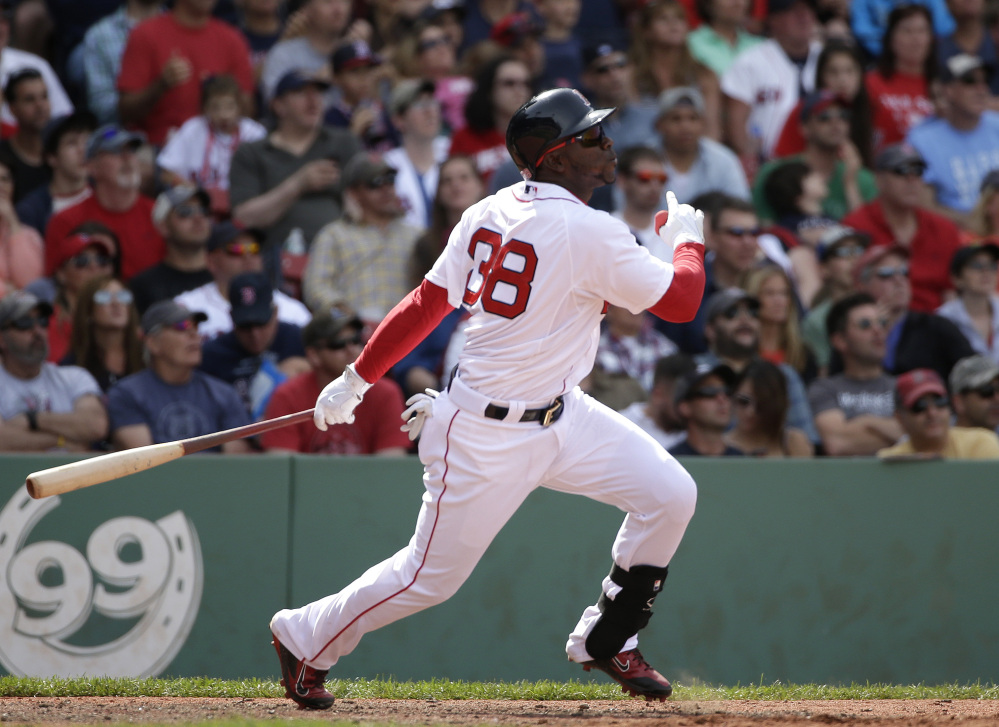 Boston’s Rusney Castillo hits a home run off a pitch by Oakland’s Kendall Graveman in the eighth inning Sunday in Boston.