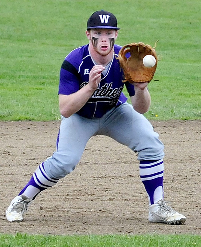 Waterville third baseman Dan Pooler prepares to make a play during an Eastern B prelim Tuesday against Gardiner. Pooler and the Purple Panthers prevailed 3-2.