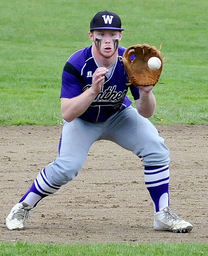 Waterville third baseman Dan Pooler prepares to make a play during an Eastern B prelim Tuesday against Gardiner. Pooler and the Purple Panthers prevailed 3-2.