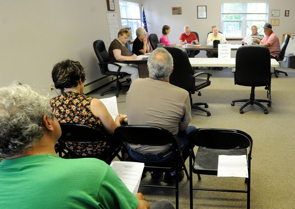 Clinton residents attend a selectmen’s meeting Thursday. The board decided to hold a referendum on the police budget, the most recent version of which was rejected Tuesday at the ballot box.