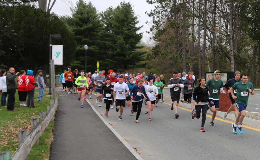 Tom Abello, of Edgecomb, leads the field in the first annual FeedME 5k Road Race for ending hunger. More than 200 walkers and 60 runners raised $33,000 for three dozen food organizations in central Maine during Maine State Credit Union’s 10th Annual Walk to End Hunger and the road race on the Kennebec River Rail Trail.