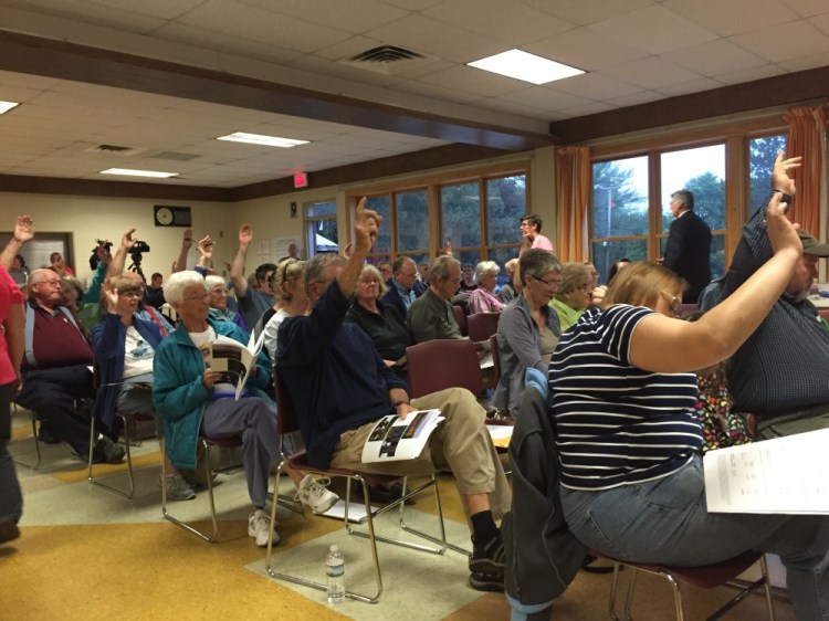 The vote on the Fire Department budget was too close to call by a simple yea or nay vote, forcing a hand count at Wilton’s Town Meeting Monday night.