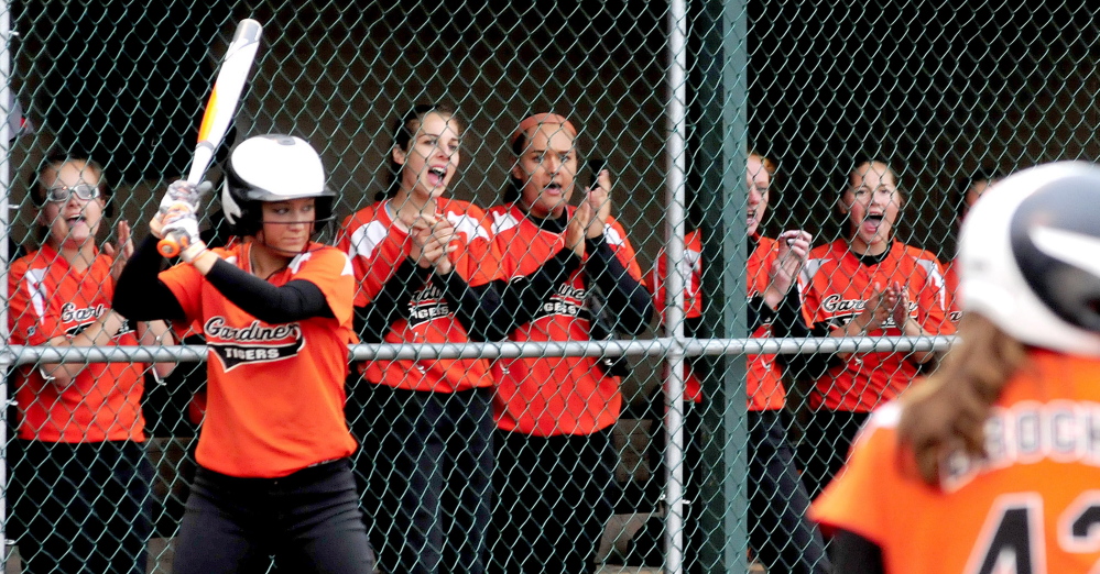 Members of the Gardiner softball team cheer on teammates during the Eastern B final Tuesday night against Hermon at Brewer High School.