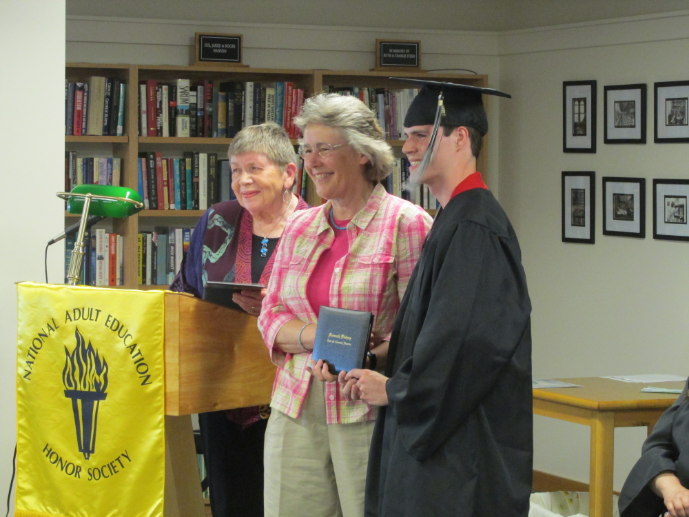 From left, Marcia Cook, director of the Monmouth/Winthrop Adult and Community Education program at Winthrop, Virginia Geyer of the Winthrop School Board, and graduate, Daniel Packard.