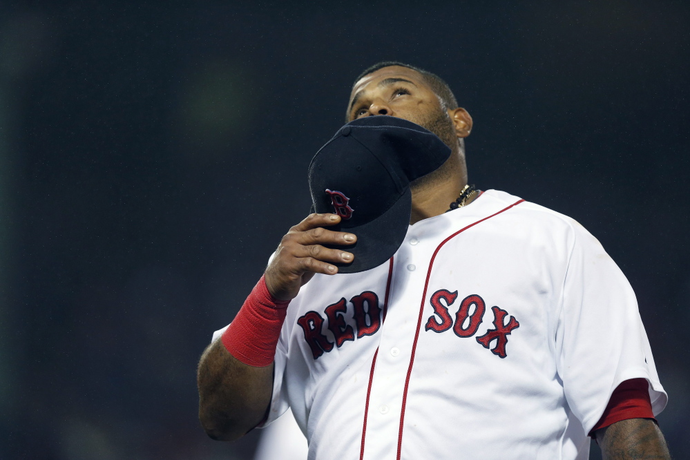 AP photo 
 Boston Red Sox third baseman Pablo Sandoval looks up as he walks to the dugout during the ninth inning of a game Monday against the Atlanta Braves in Boston.