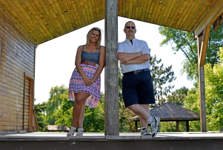 Andrew Bourassa and his daughter, Amber, on Wednesday are seen at Fort Halifax Park in Winslow. Bourassa recently underwent gastric bypass surgery and will be participating in the Trek Across Maine.